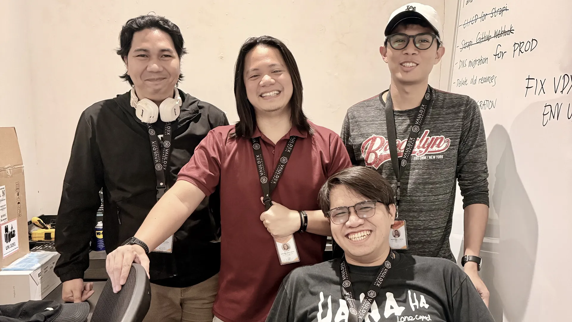 Kynji is standing among the infla team members.