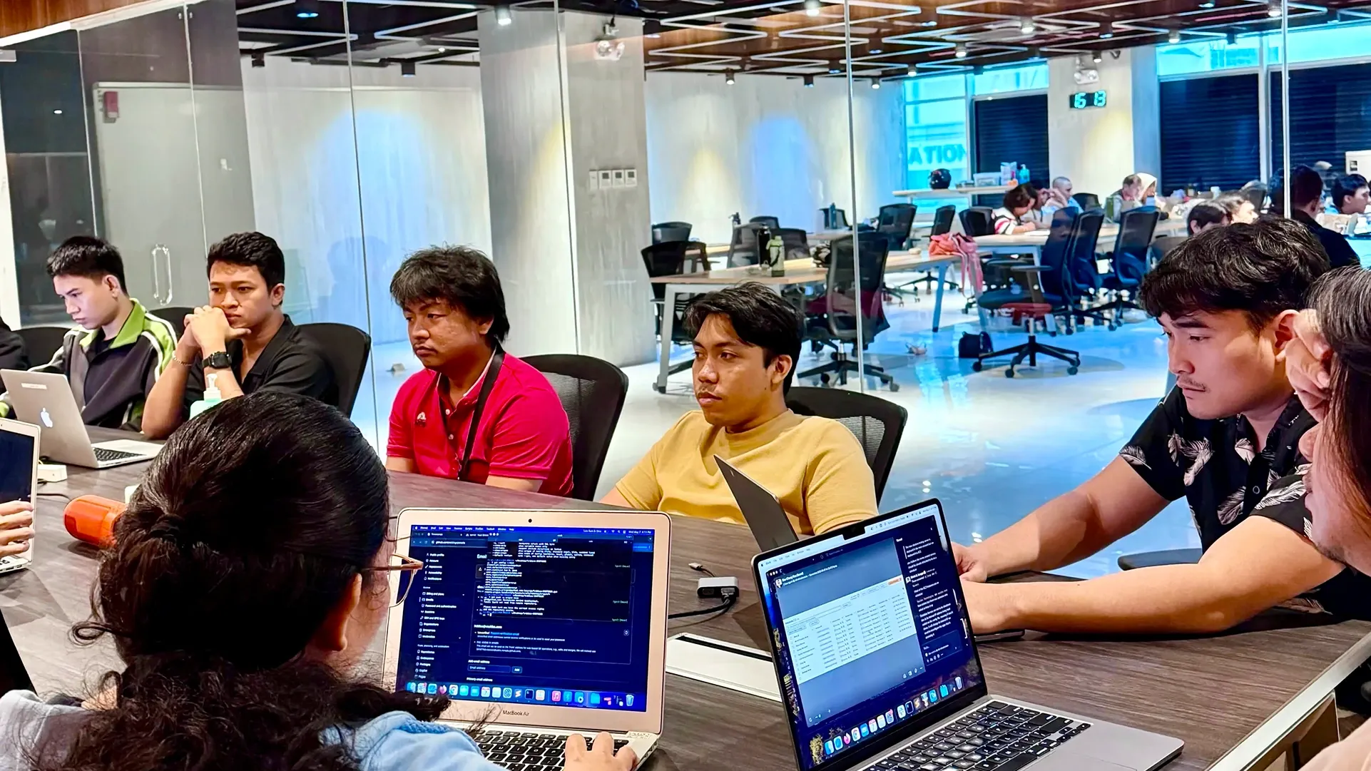 Kem is in the meeting with his team